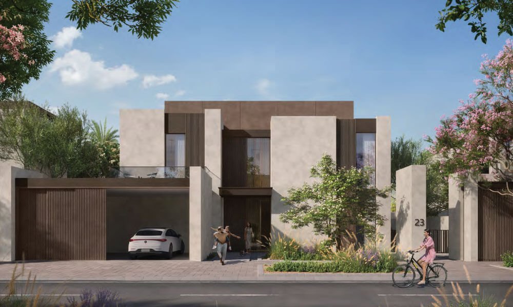 Villa entrance with a slatted garage, a white car under the carport and a cyclist at the kerb at Diagon, Athlon in Dubailand.