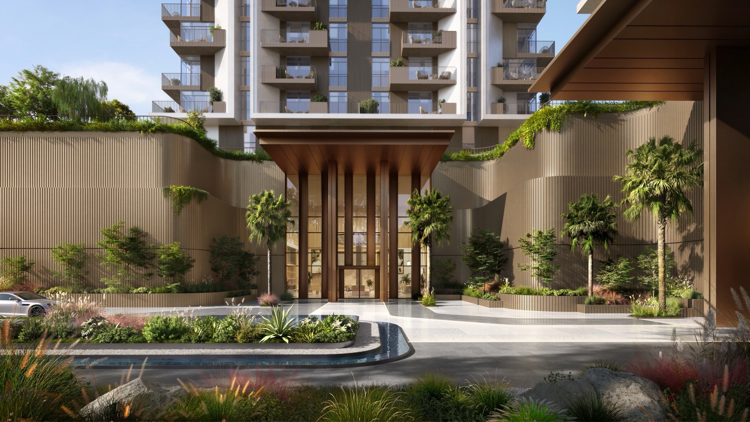 Timber porte-cochere with vertical wood fins between bronze screen walls, under a balcony tower, a facade render for Neon at Rise by Athlon in Wadi Al Safa 5, Dubailand. It is not a measured floor plan.